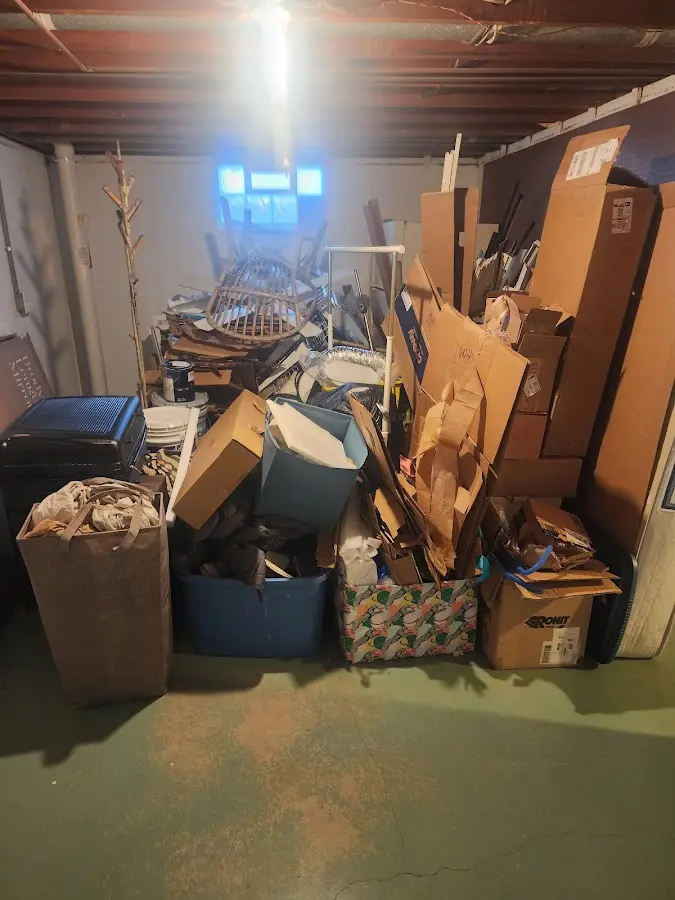 Roll-off dumpster container at job site for Cleanout Dumpster Rental in South St. Paul